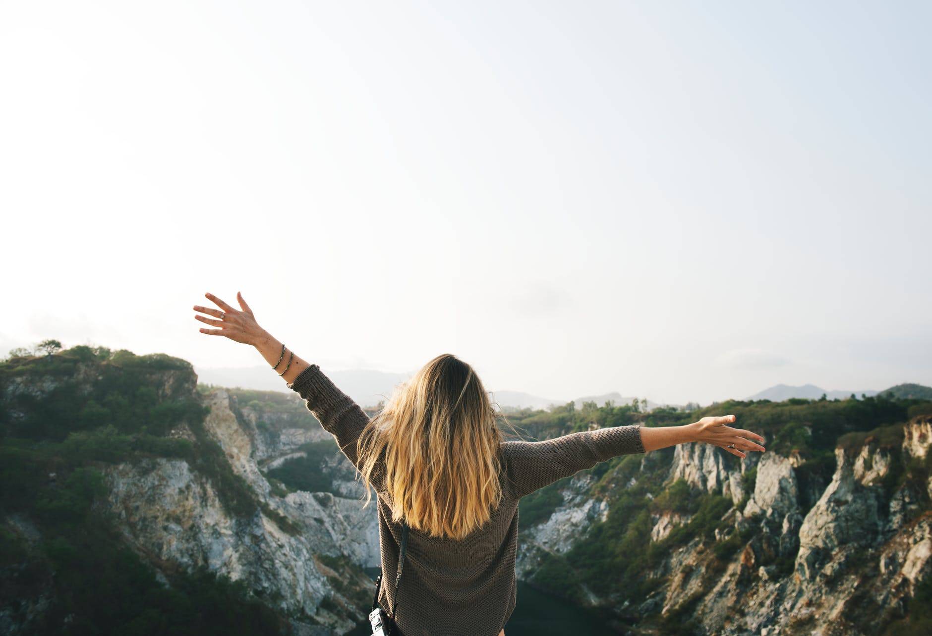 woman looking peaceful relaxed and free