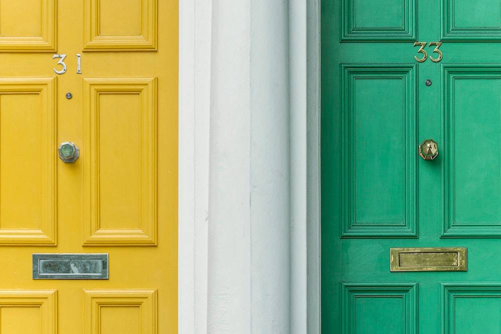 yellow door and green door side by side