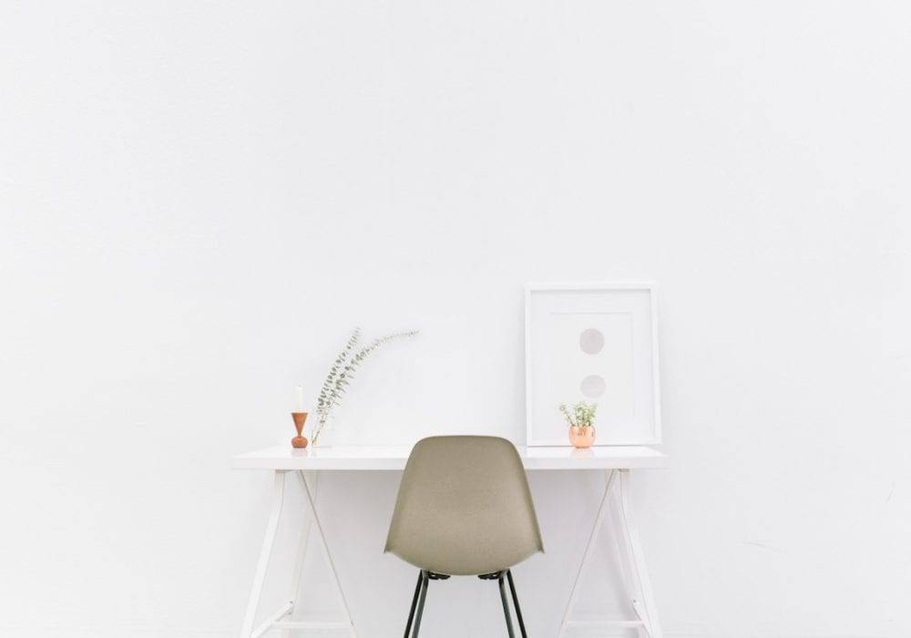 declutter your life minimalist chair and desk in a room