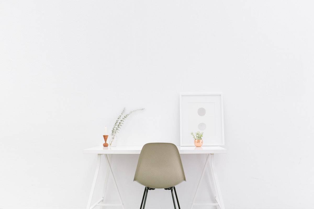 declutter your life minimalist chair and desk in a room