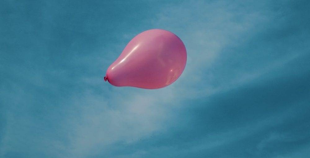 a balloon blowing in the wind - when to bless and release a client