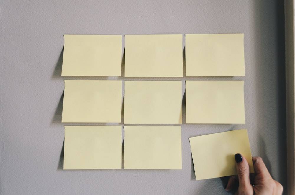 nine post-it notes stuck on the wall