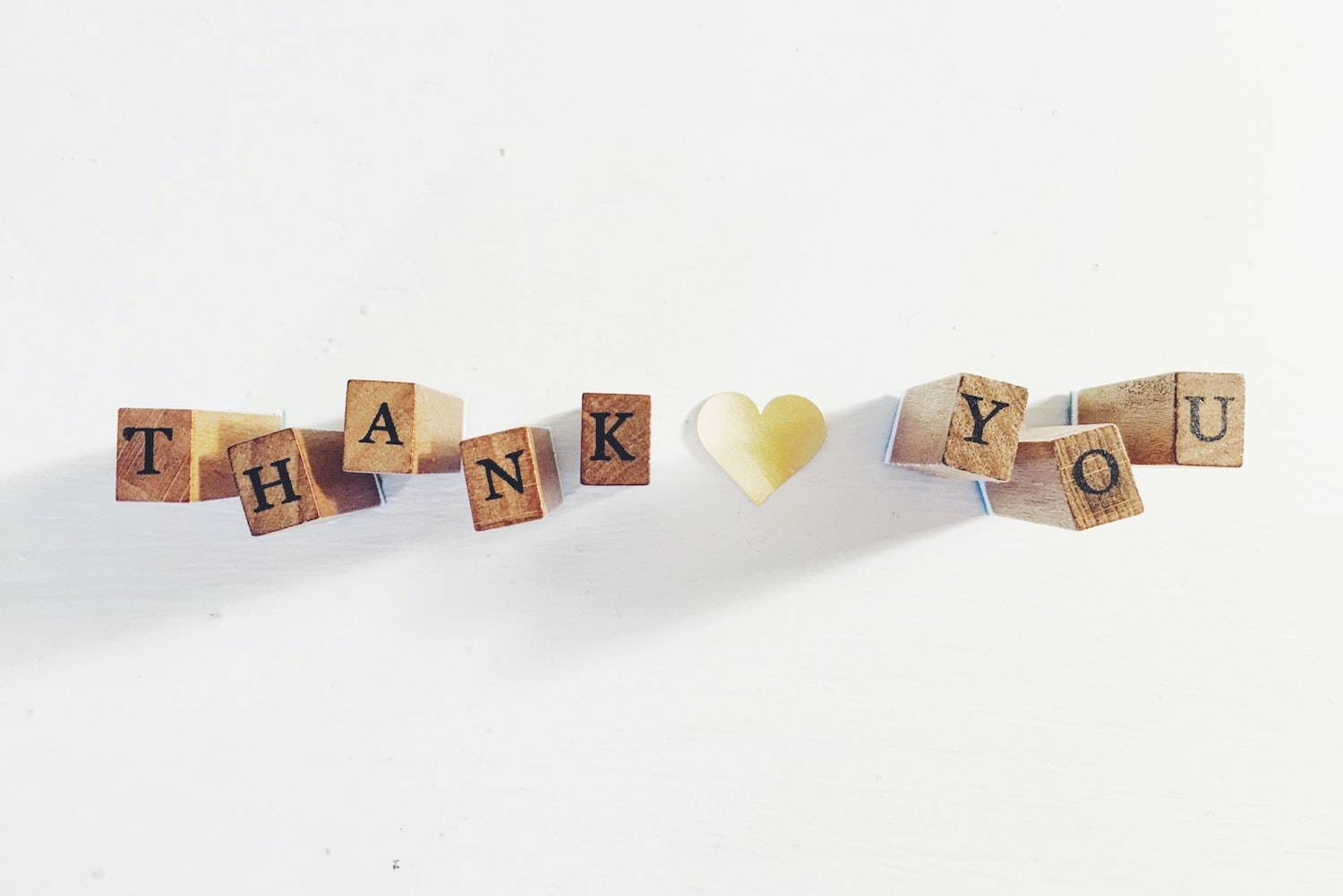 The Thank You List: scrabble letters spelling out the word thank you