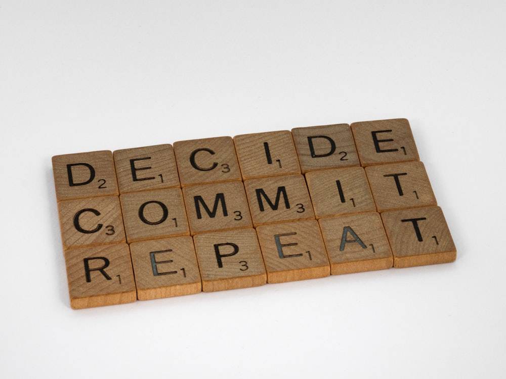 Should I do it yes or no - scrabble tiles that spell decide commit repeat