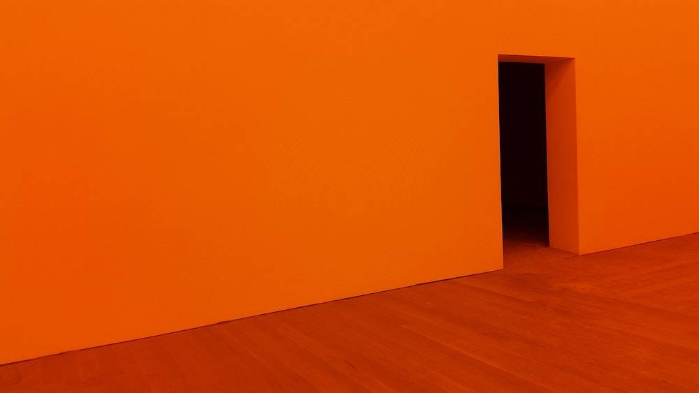 an orange room with doorway