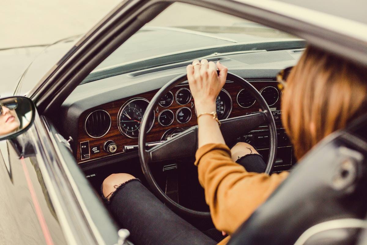 site slow to load - woman driving a car