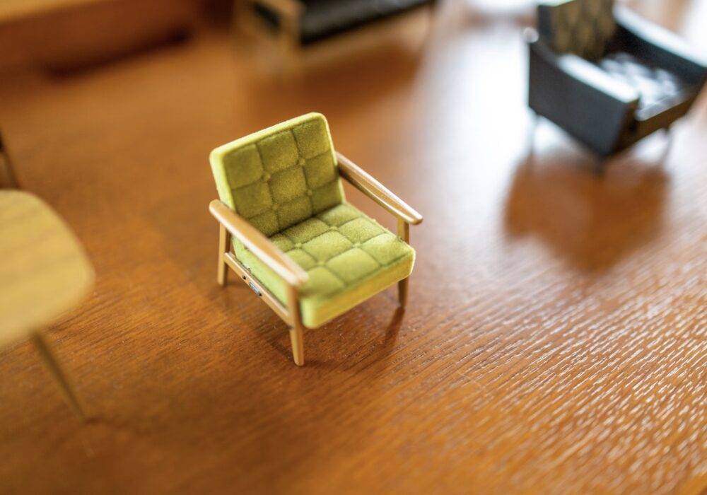 little things in business - a miniature green office chair