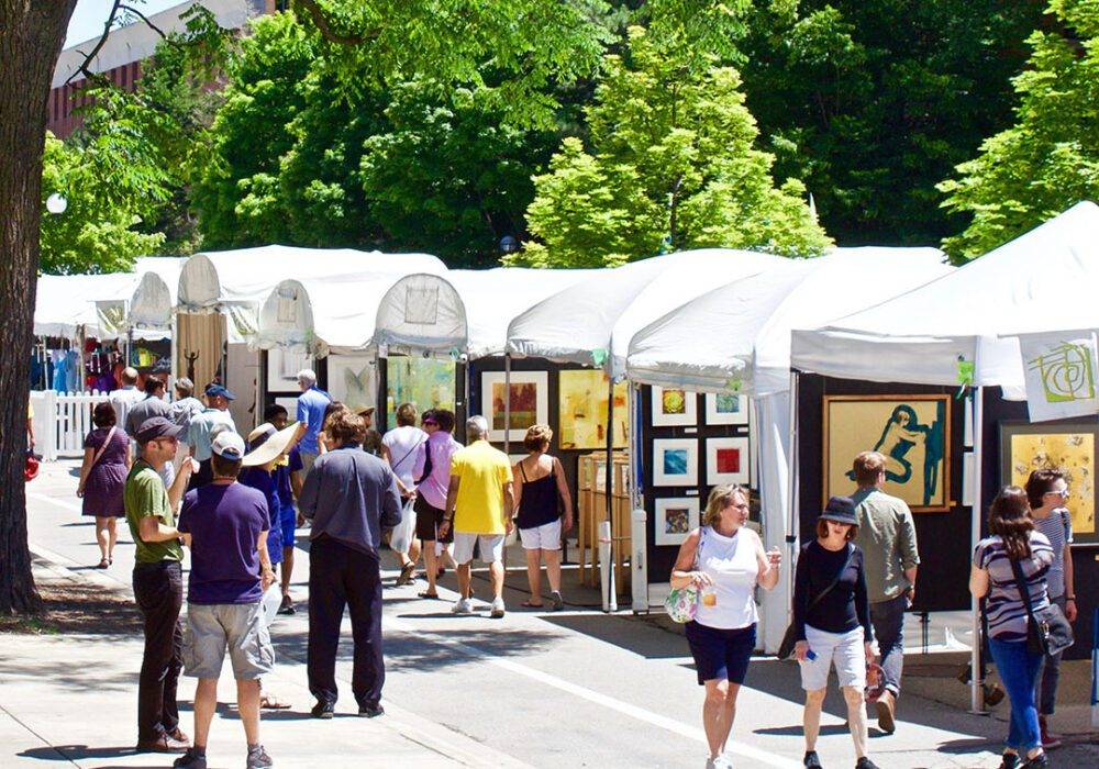 people walking at street art fair