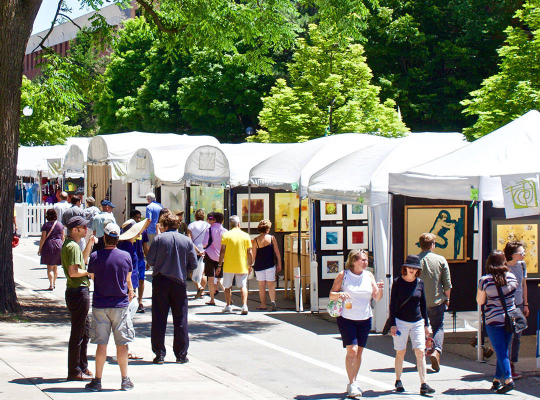 people walking at street art fair