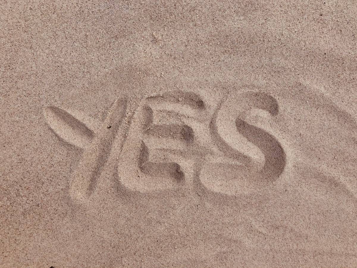 Yes written in the sand