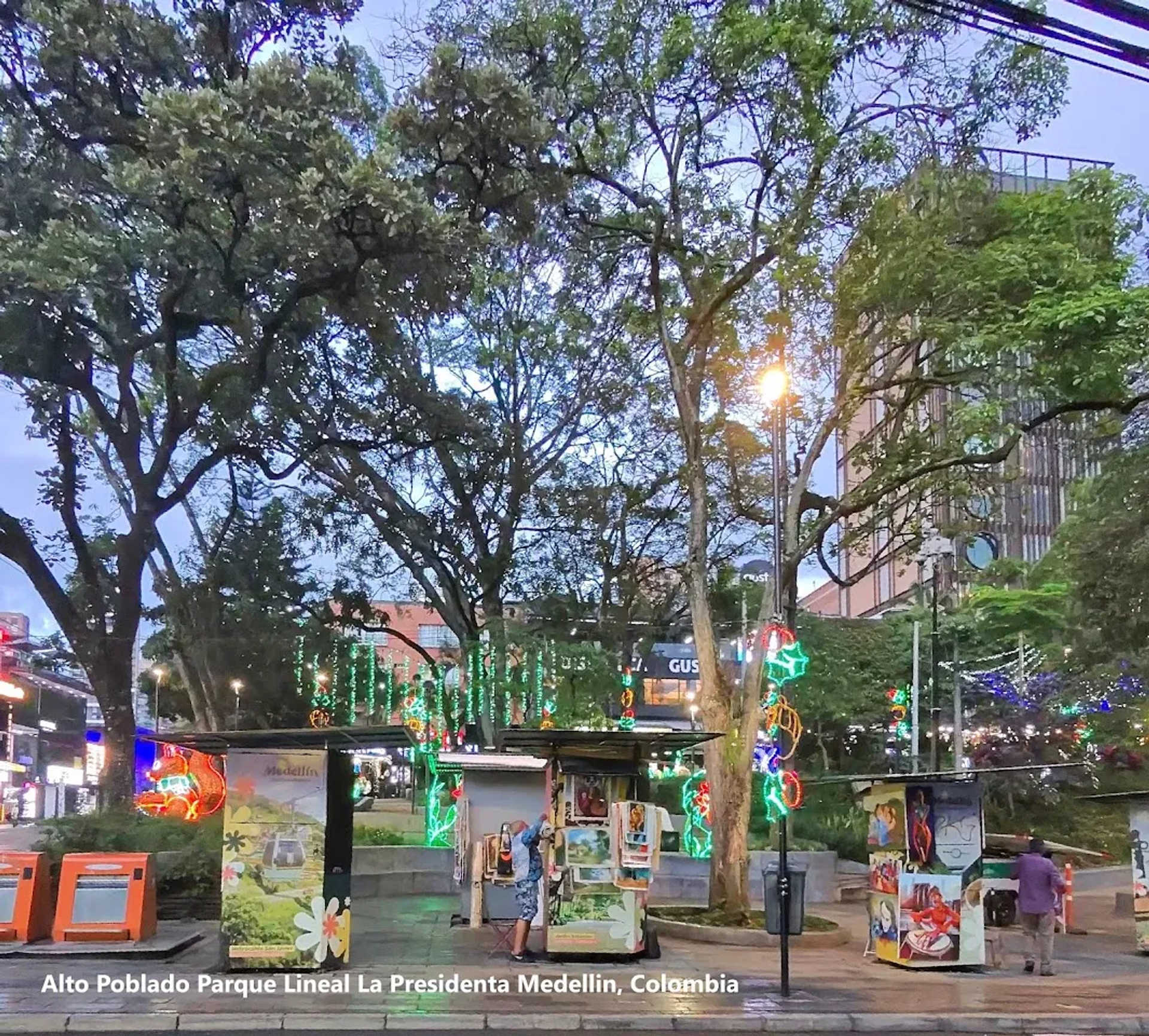 Parque Lleras at night, with people partying and nightlife in El Poblado streets