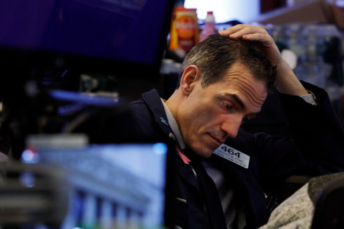 THE DOW Jones Industrial Average lost 1,582 points, or 6.1%, to start the day Monday. / AP FILE PHOTO/ RICHARD DREW