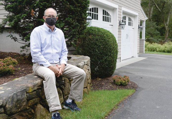 WORTH THE RISK? Even Mark A. Male, executive vice president of the Independent Insurance Agents of Rhode Island, sometimes finds himself wondering if he should pay for flood coverage on his South Kingstown house that isn’t in a high-risk area. / PBN PHOTO/ELIZABETH GRAHAM