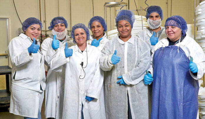 PREP WORK: Employees who work in Blount Fine Foods Corp.’s preparation room give a thumbs-up.
COURTESY BLOUNT FINE FOODS CORP. PREP WORK: Employees who work in Blount Fine Foods Corp.’s preparation room give a thumbs-up.
COURTESY BLOUNT FINE FOODS CORP.
