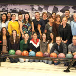 READY TO ROLL: The staff from Brokers’ Service Marketing Group LLC ­enjoys its 2019 company outing near the bowling lanes at R1 Indoor Karting in Lincoln.  COURTESY BROKERS’ SERVICE MARKETING GROUP LLC