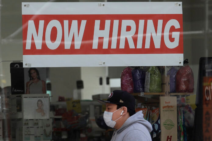 THE NUMBER of individuals collecting continuing unemployment benefits in Rhode Island totaled 65,387 last week. / AP FILE PHOTO/JEFF CHIU