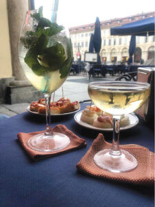 THE RIGHT INGREDIENTS: Drinks and food are served at a café in Turin, Italy, for aperitivo, a traditional time for post-work relaxation in Italy.   / COURTESY JESSICA GRANATIERO