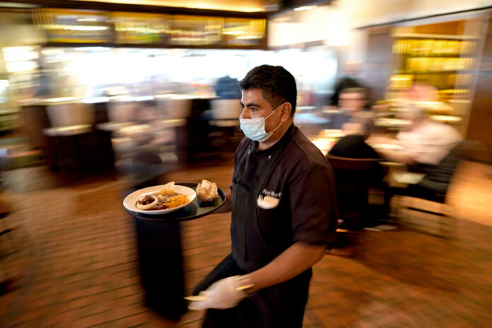Marcelino Flores COMBINED COLLECTIONS of the local 1% meal and beverage and hotel taxes in Rhode Island increased 44.8% year over year in July. / AP FILE PHOTO/DAVID J. PHILLIP