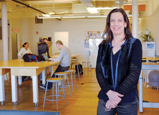 SMALL-BUSINESS STARTER: Providence-based Maternova Inc. was the first medtech venture to complete an accelerator program at Social Enterprise Greenhouse. The company’s founder, Meg Wirth, foreground, is now SEG’s director of health and wellness. / PBN FILE PHOTO/ELIZABETH GRAHAM