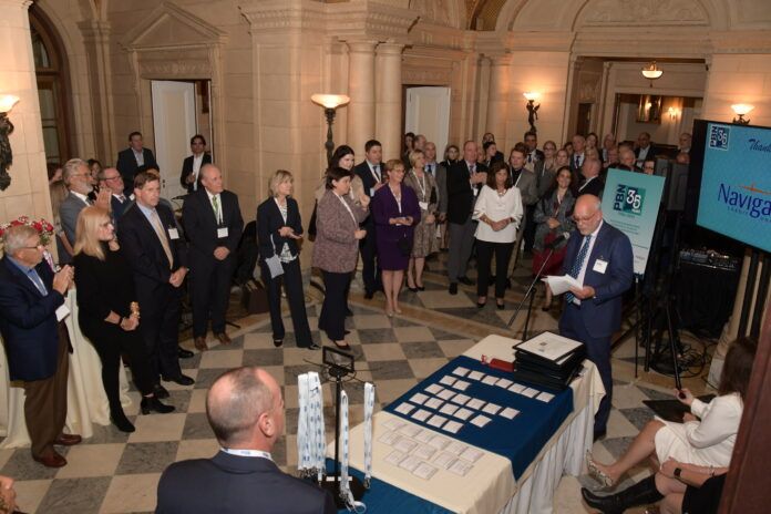 ROGER C. BERGENHEIM, far right, president and publisher of Providence Business News, delivers a speech Thursday to multiple business professionals in attendance at the news publication's 35th Anniversary Gala at Aldrich Mansion in Warwick. / PBN PHOTO/MIKE SKORSKI ROGER C. BERGENHEIM, far right, president and publisher of Providence Business News, delivers a speech Thursday to multiple business professionals in attendance at the news publication's 35th Anniversary Gala at Aldrich Mansion in Warwick. / PBN PHOTO/MIKE SKORSKI