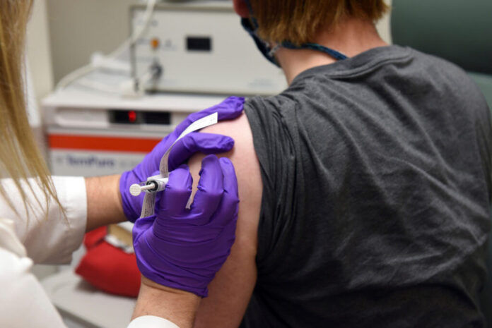 Vaccine AP file photo-Ted S. Warren