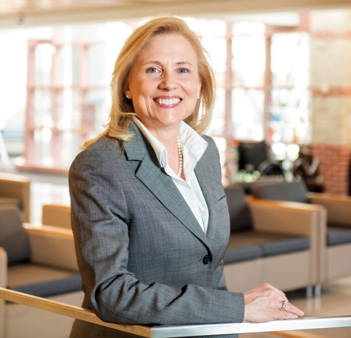 IMPACTFUL LEADER: Whether working as a nurse in an intensive care unit or taking on additional responsibilities in executive roles, Cathy Duquette, executive vice president of quality and safety and chief nursing executive at Lifespan Corp. in Providence, enjoys making a difference in her community. / PBN PHOTO/DAVE HANSEN IMPACTFUL LEADER: Whether working as a nurse in an intensive care unit or taking on additional responsibilities in executive roles, Cathy Duquette, executive vice president of quality and safety and chief nursing executive at Lifespan Corp. in Providence, enjoys making a difference in her community. / PBN PHOTO/DAVE HANSEN