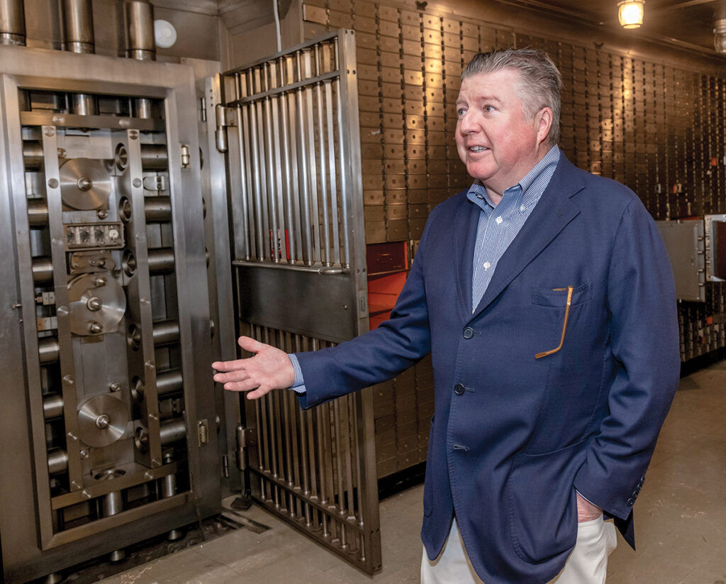 William Fischer, spokesperson for the building owner, High Rock Development LLC, tours the vault in the Industrial Trust Co. Building.
PBN PHOTO/MICHAEL SALERNO