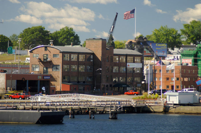 CONLEY'S PIER, a mixed-use development along Providence's Allens Avenue that included a 765-foot deep-water dock, has been purchased by National Grid, which intends to remediate the property before putting it to an unspecified use. / PBN FILE PHOTO/BRIAN MCDONALD CONLEY'S PIER, a mixed-use development along Providence's Allens Avenue that included a 765-foot deep-water dock, has been purchased by National Grid, which intends to remediate the property before putting it to an unspecified use. / PBN FILE PHOTO/BRIAN MCDONALD