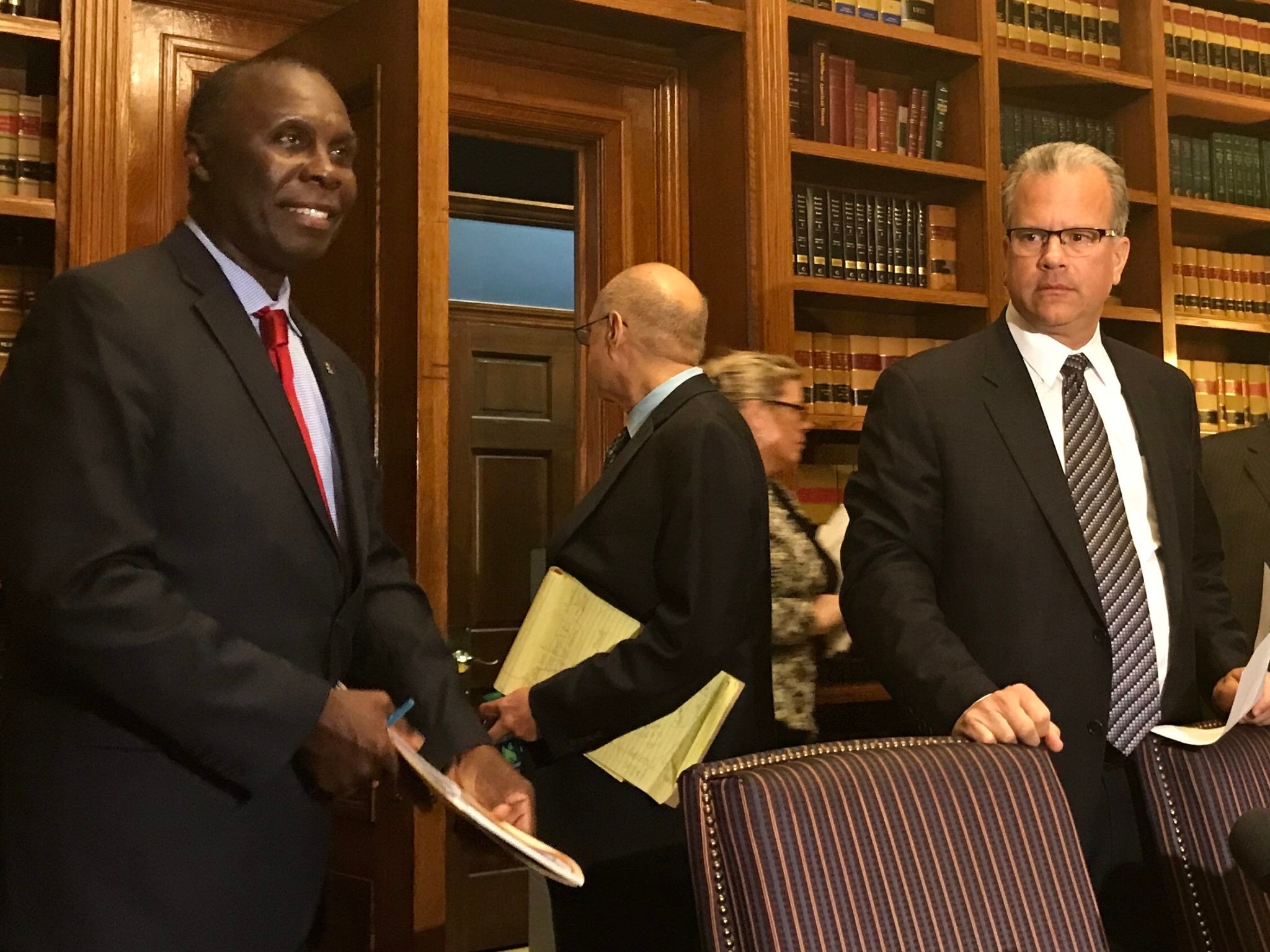 R.I. HOUSE FINANCE Chairman Marvin L. Abney, left, with House Speaker Nicholas A. Mattiello, right, on June 15 unveiled the Democrat's $9.2 billion spending plan for fiscal 2018. / PBN FILE PHOTO/ELI SHERMAN
