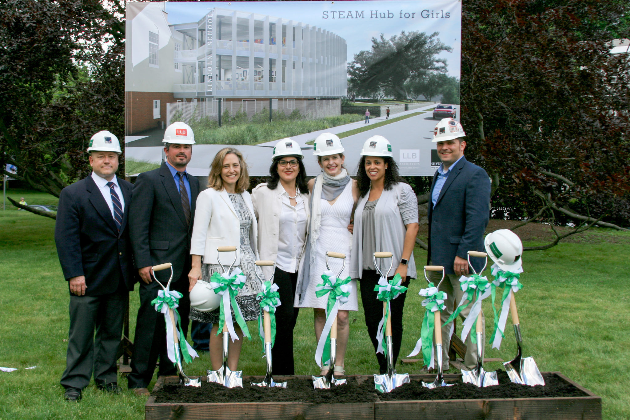 THE LINCOLN SCHOOL BROKE GROUND on its new STEAM building. From left, Ron Simoneau, vice president, Shawmut Design and Construction; Brian Valentine, project manager, LLB Architects; Kathleen Bartels, principal, LLB Architects; Nancy Nahigian Tavitian, chair, Lincoln School's STEAM Hub Steering Committee; Suzanne Fogarty, head of school, Lincoln School; Corine Andrade, project manager, Shawmut Design and Construction; Chris Maury, project executive, Shawmut Design and Construction /COURTESY SHAWMUT DESIGN AND CONSTRUCTION
