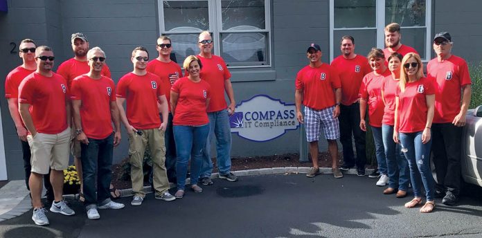 FENWAY MEET: Compass IT Compliance employees meet for a September 2017 trip to Fenway Park in Boston.
 / COURTESY COMPASS IT COMPLIANCE FENWAY MEET: Compass IT Compliance employees meet for a September 2017 trip to Fenway Park in Boston.
 / COURTESY COMPASS IT COMPLIANCE