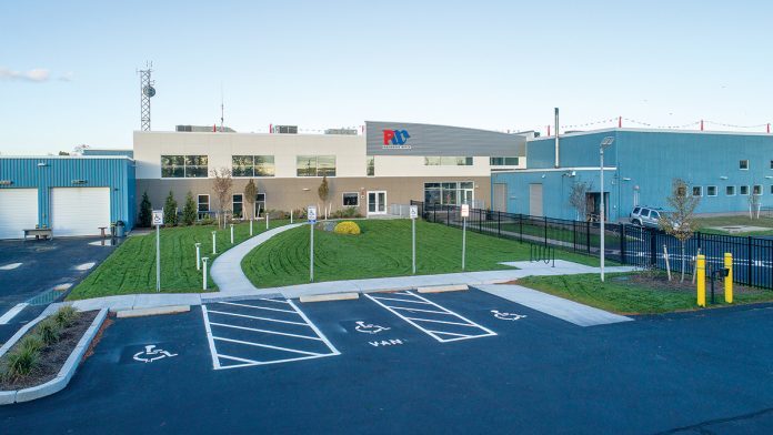 A FRESH FACE: As part of the refurbishment of Providence Water’s central operation facility on Dupont Drive, the blue-colored front entrance of the former Bank of America data and call center was updated with new signage and color scheme, as well as landscaped grass. A FRESH FACE: As part of the refurbishment of Providence Water’s central operation facility on Dupont Drive, the blue-colored front entrance of the former Bank of America data and call center was updated with new signage and color scheme, as well as landscaped grass.