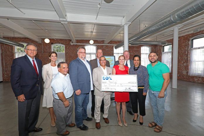 COX BUSINESS recognizes companies making the most of technology in its Rhode Island Smart Business Tour. From left, Jay Allbaugh, region manager, and Leigh Woisard, senior vice president of public affairs, of Cox Communications; Pawtucket City Councilman Albert Vitali; Todd Knapp, CEO, Envision Technology Advisors; Pawtucket City Councilman Michael Araujo; Pawtucket Mayor Donald R. Grebien; Brigid Nee Newman, development manager, Year Up Providence; Ross Nelson, vice president Northeast, Cox Business; Sujata Gosalia, chief strategy officer, Cox Communications; and Rep. Carlos E. Tobon, D-Pawtucket.
