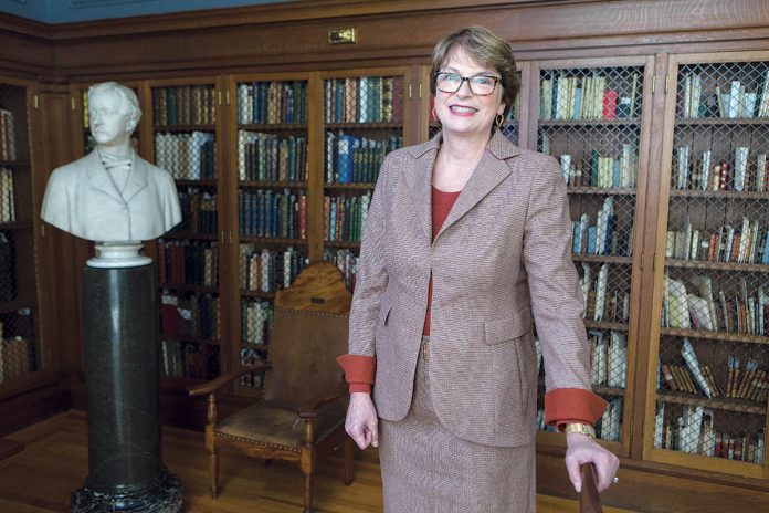 DYNAMIC DIRECTION: Christina H. Paxson, president of Brown University, in the Bruhn Room in the university’s John Hay Library. / PBN PHOTO/RUPERT WHITELEY DYNAMIC DIRECTION: Christina H. Paxson, president of Brown University, in the Bruhn Room in the university’s John Hay Library. / PBN PHOTO/RUPERT WHITELEY