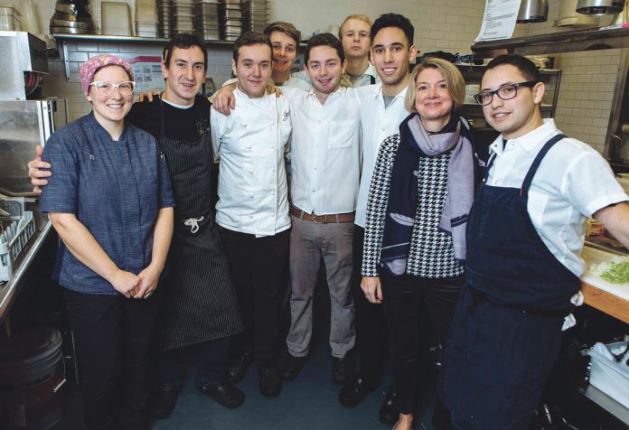 GRACIE’S TEAM: Gracie’s Ventures owner Ellen Slattery, second from right, with, from left, Melissa Denmark, executive pastry chef; Matt Varga, executive chef; Brian O’Connell; Griffin Vosbeck; Jordan Fleischer; Johnathan Maccini; Andres Rodriguez; and Josh Berman. Slattery said the biggest challenge has been hiring but the restaurant has had the same team for a year. / PBN PHOTO/RUPERT WHITELEY GRACIE’S TEAM: Gracie’s Ventures owner Ellen Slattery, second from right, with, from left, Melissa Denmark, executive pastry chef; Matt Varga, executive chef; Brian O’Connell; Griffin Vosbeck; Jordan Fleischer; Johnathan Maccini; Andres Rodriguez; and Josh Berman. Slattery said the biggest challenge has been hiring but the restaurant has had the same team for a year. / PBN PHOTO/RUPERT WHITELEY