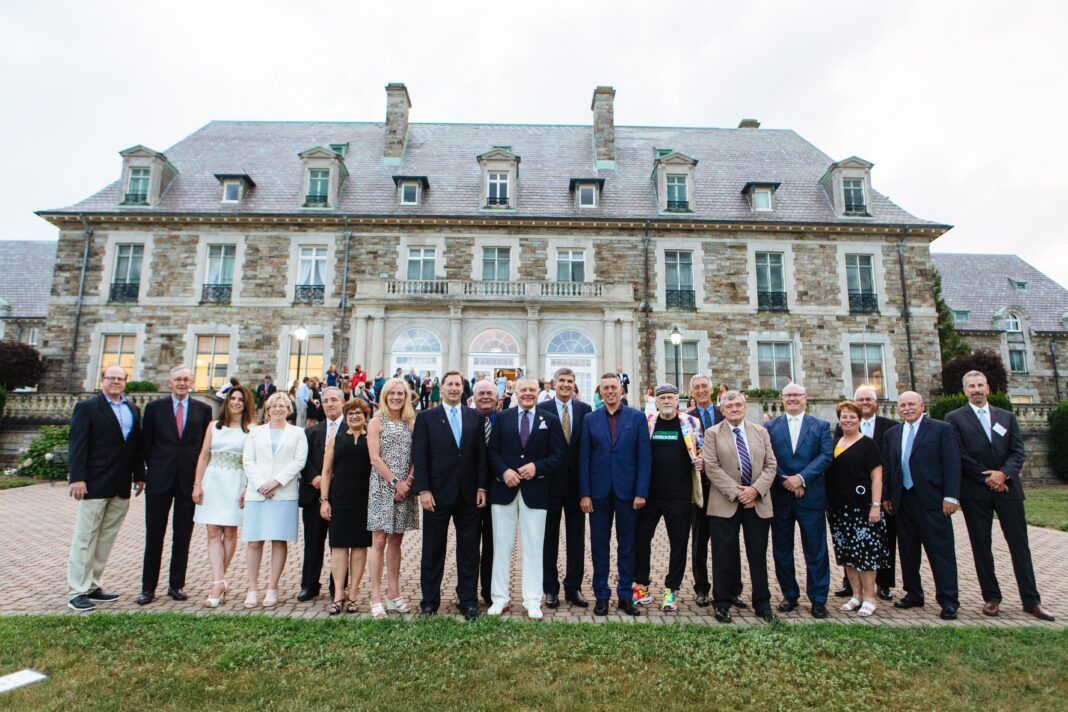 THE HONOREES of PBN's inaugural 25 Over Fifty-five event stand before Aldrich Mansion in Warwick on Thursday. / PBN PHOTO/RUPERT WHITELEY THE HONOREES of PBN's inaugural 25 Over Fifty-five event stand before Aldrich Mansion in Warwick on Thursday. / PBN PHOTO/RUPERT WHITELEY