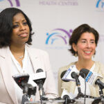 NEW ROLE: Womazetta Jones, left, who was nominated by Gov. Gina M. Raimondo, right, as secretary of the R.I. Executive Office of Health and Human Services and began her new role in late July, said there’s an absolute necessity to better deliver services respectful of cultural and economic diversity.  / COURTESY DAVID LEVESQUE