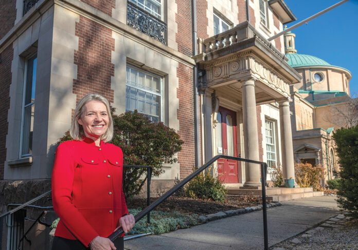 CARETAKER: Jo Ellen Mistarz is the executive director of The Village Common of Rhode Island, which has its office at Hamilton House in Providence and connects seniors with volunteer services. Despite the thousands of elderly people in Rhode Island, Mistarz says only about 200 are members of organizations such as the Providence Village, which is part of the Village Common. / PBN PHOTO/MICHAEL SALERNO CARETAKER: Jo Ellen Mistarz is the executive director of The Village Common of Rhode Island, which has its office at Hamilton House in Providence and connects seniors with volunteer services. Despite the thousands of elderly people in Rhode Island, Mistarz says only about 200 are members of organizations such as the Providence Village, which is part of the Village Common. / PBN PHOTO/MICHAEL SALERNO