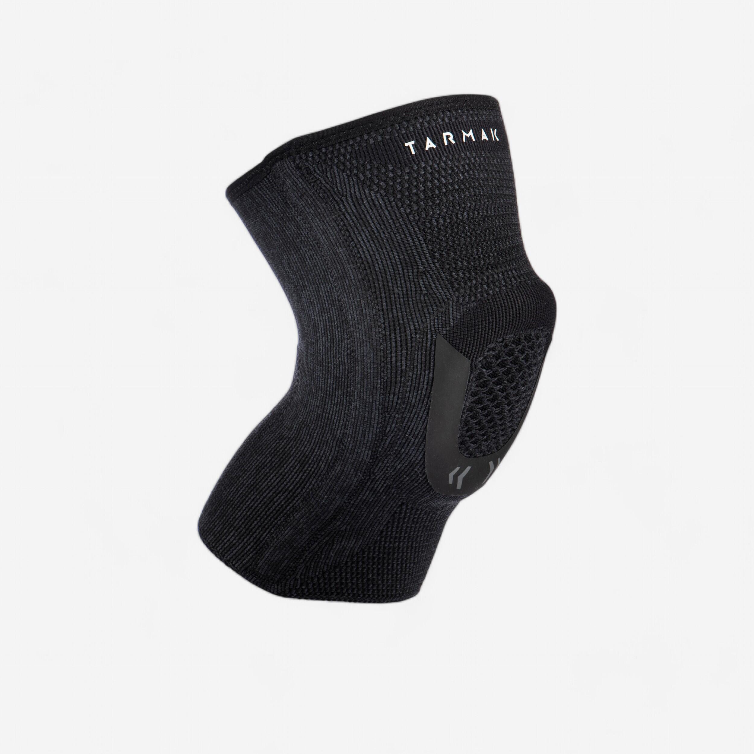 Tarmak Kniebandage Strong 100 links/rechts Damen/Herren