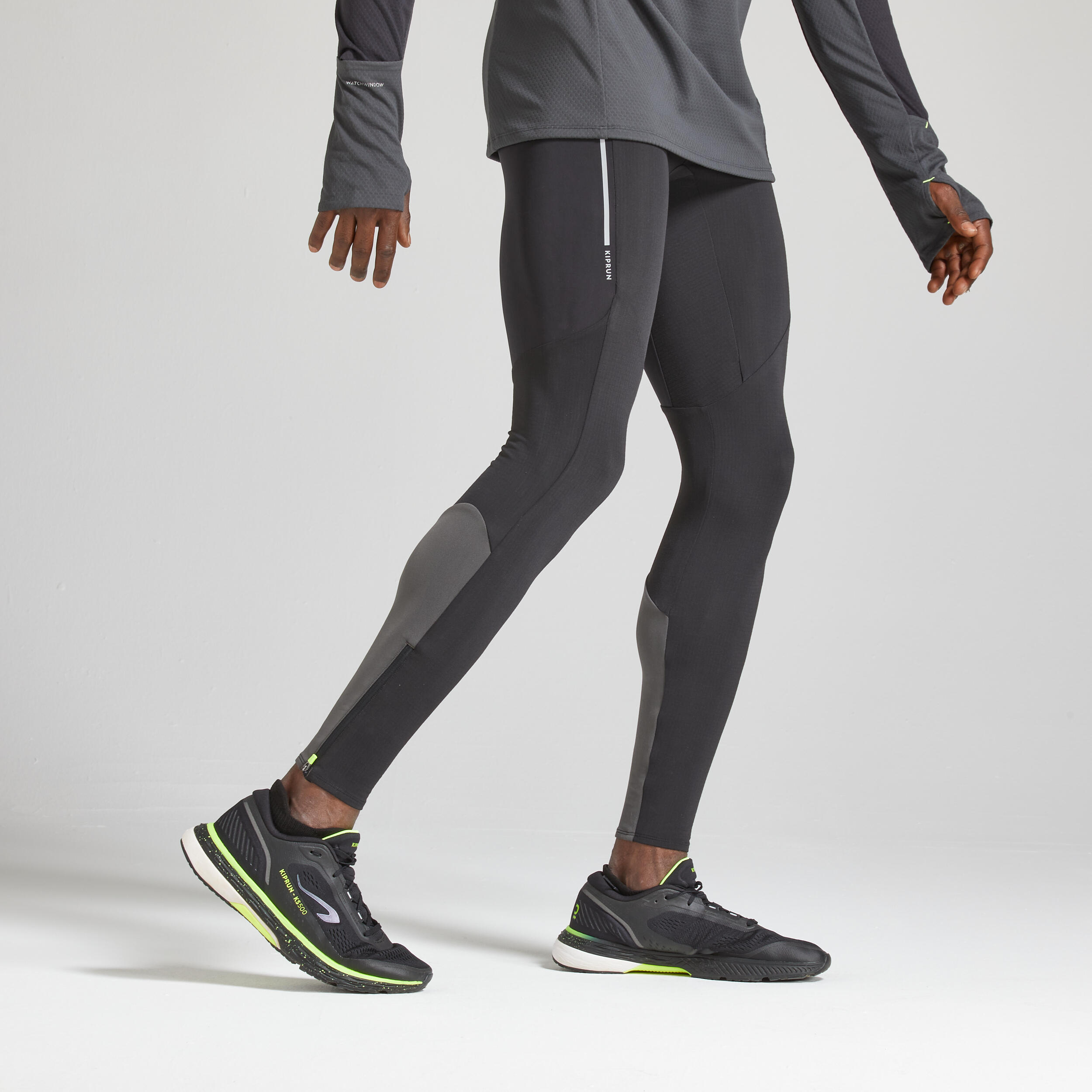 Kiprun Laufhose lang Tights Kiprun Warm Herren schwarz/gelb limitierte Auflage