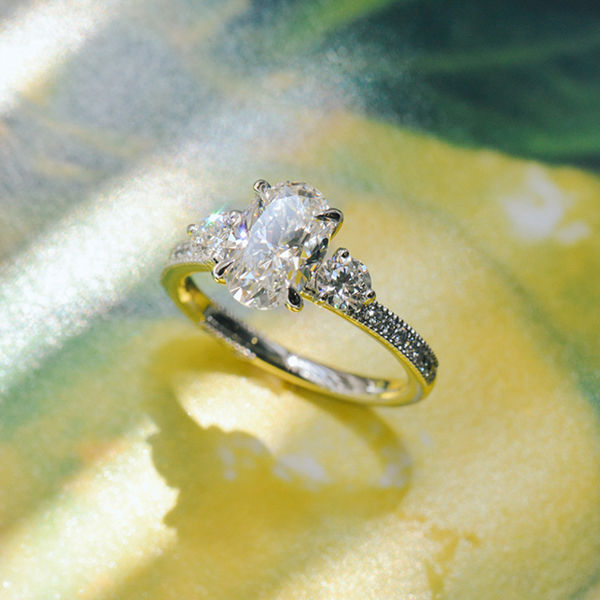 Oval And Round Three Stone Engagement Ring With Pavé-top