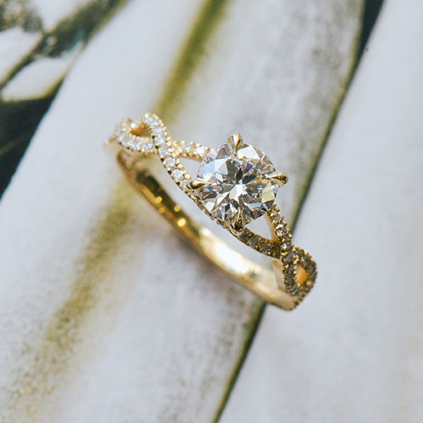 Round 4-Prong Engagement Ring With Pavé Twist Band-side