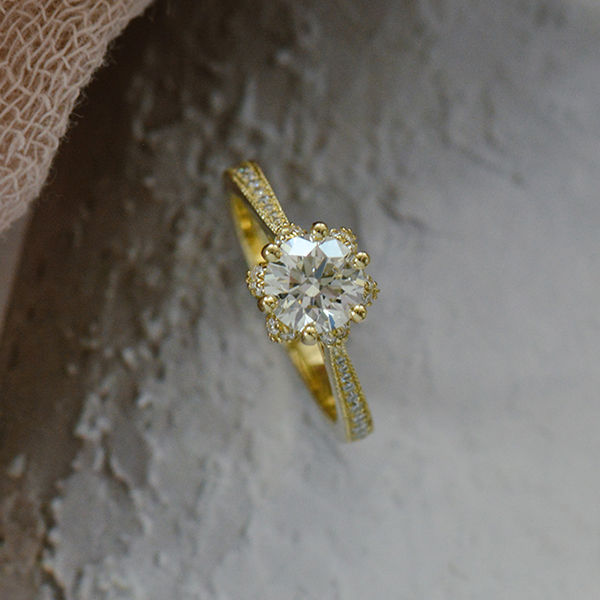 Round Engagement Ring With Floral Halo -side