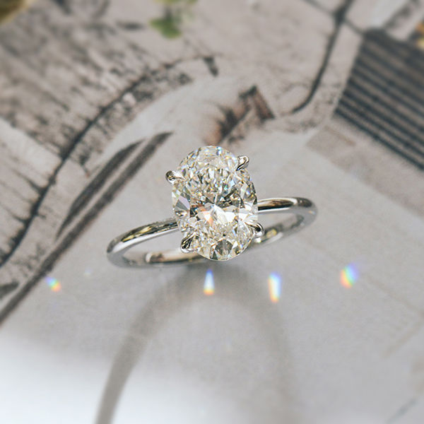 Oval Solitaire Engagement Ring With Hidden Halo-side