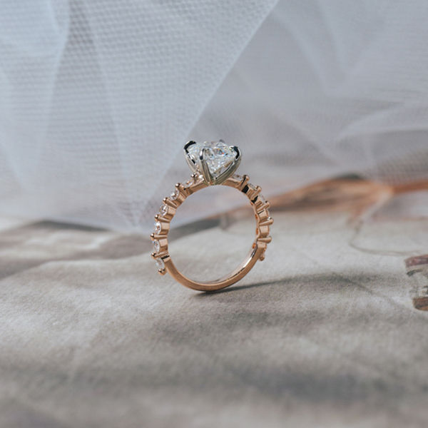 Cushion Engagement Ring With Pavé Single Prong Band-side