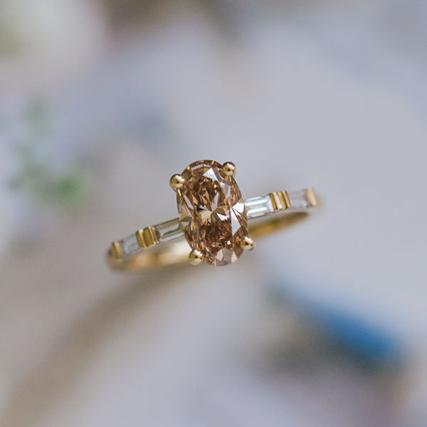 Oval Engagement Ring With Straight Baguette Side Stones-top