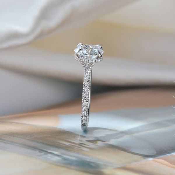 Round Hidden Halo Engagement Ring With Pavé Band-side