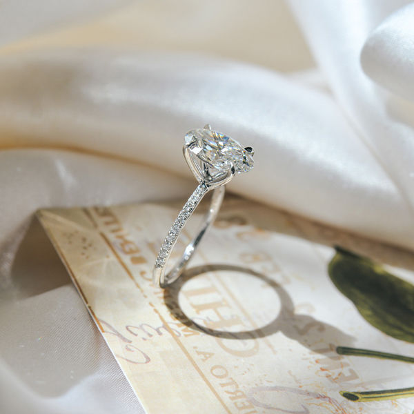 Solitaire Oval Engagement Ring With Pavé Band-side