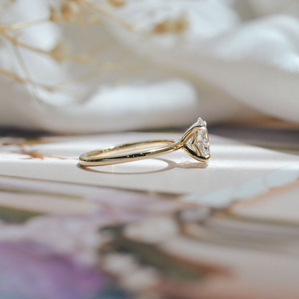 Solitaire Oval Engagement Ring With Whale Tail-side