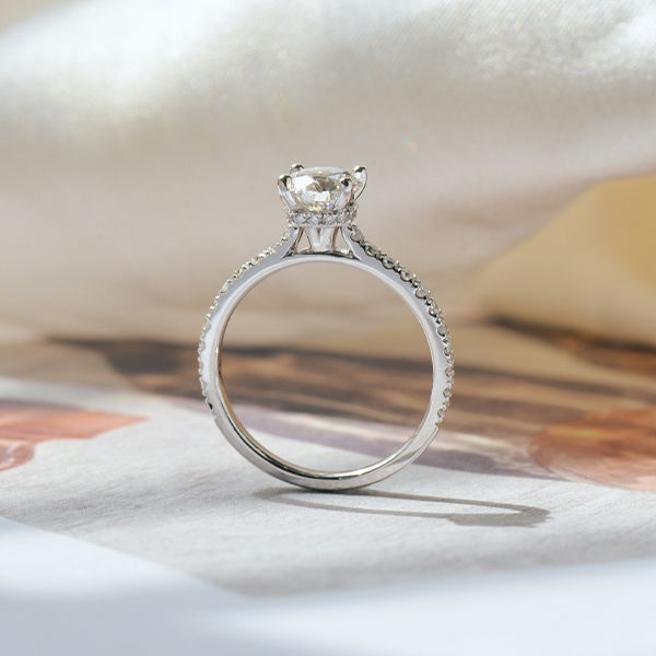 Round Engagement Ring With Hidden Halo Around the Prongs-profile